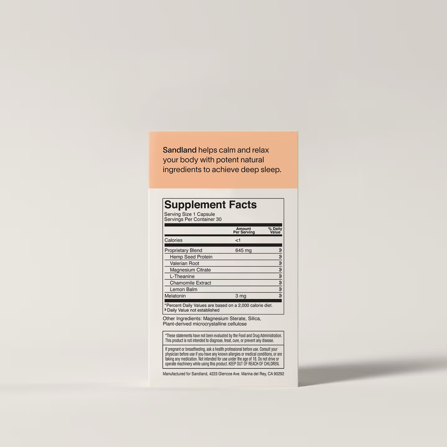 Supplement label with 'Sandland' product description on a light gray background