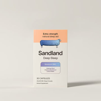 Box of Sandland Deep Sleep capsules on a light gray background