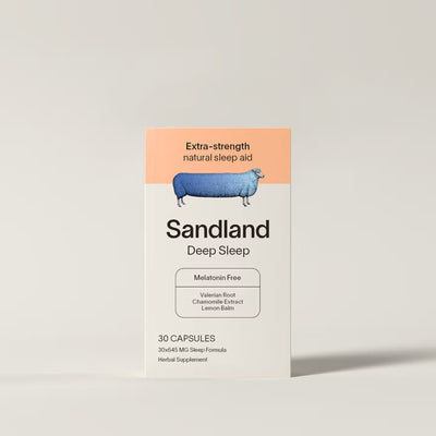 Box of Sandland Deep Sleep capsules on a light gray background