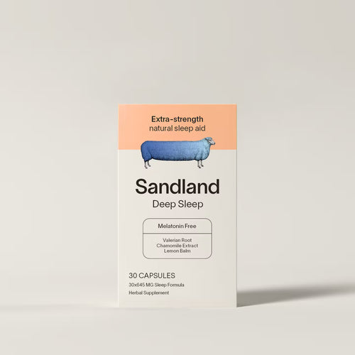 Box of Sandland Deep Sleep capsules on a light gray background