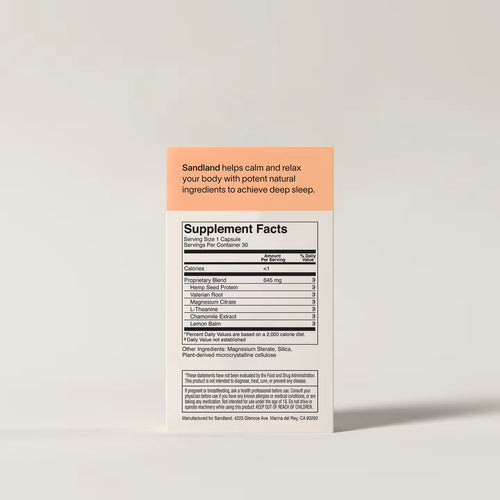 Supplement label with 'Sandland' branding on a light gray background